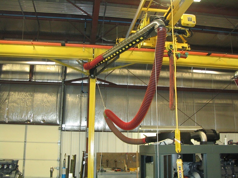 Fume-A-Vent Pivoting Articulating Boom Arm stores tightly against the wall and swings out when needed. 
