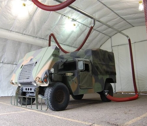 Fume-A-Vent exhaust removal system shown installed and attached to a military vehicle.