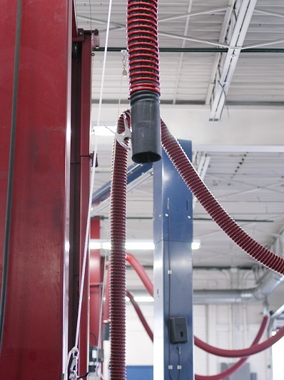 Fume-A-Vent overhead vehicle exhaust removal system installed to capture and exhaust emissions away from the work environment.
