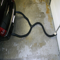 Crushproof hose system for garage exhaust removal